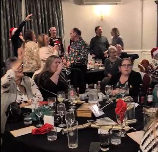 Guests joining in the Scrooge Christmas performance